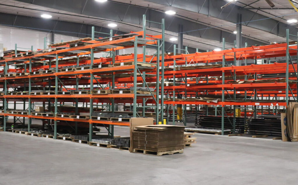 finished laser-cut parts organized on shelves