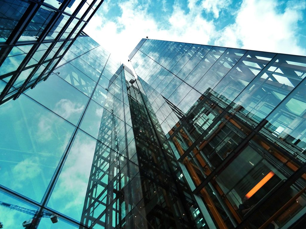 glass and metal building, showing the impact of laser cutting to make architectural panels