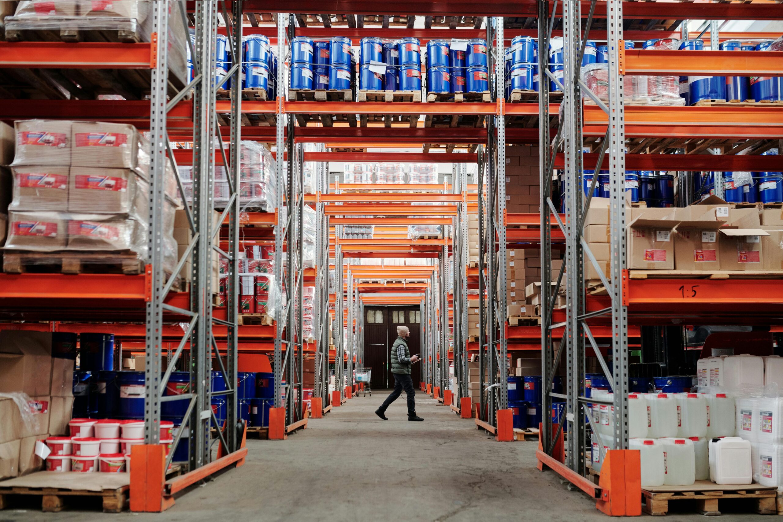 person walking in a warehouse