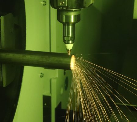 Close up of a laser tube cutting machine cutting a tube